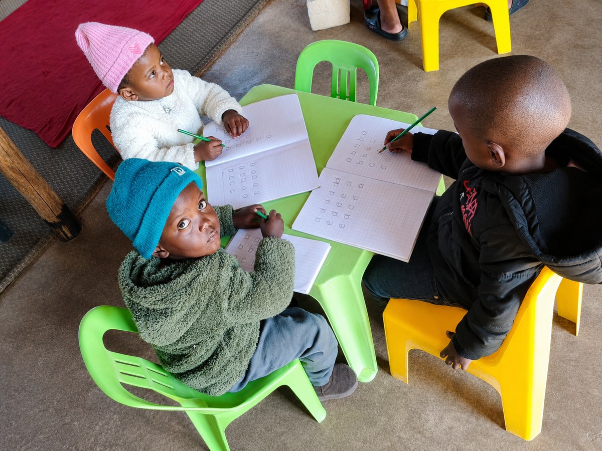 Children practicing writing at Sunrise Early Learning Centre